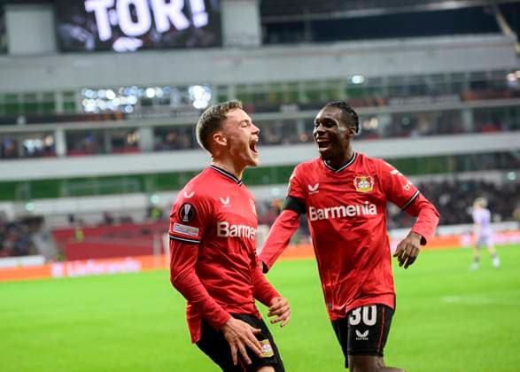 Jubel Florian WIRTZ (LEV) nach seinem Tor zum 2:1, r. Jeremie FRIMPONG (LEV) Fussball Europa League, K.-o. Runde - Play-off Hinspiel, Bayer 04 Leverkusen (LEV) - AS Monaco, am 16.02.2023 in Leverkusen Deutschland. UEFA regulations prohibit any use of photographs as image sequences and or quasi-video Â