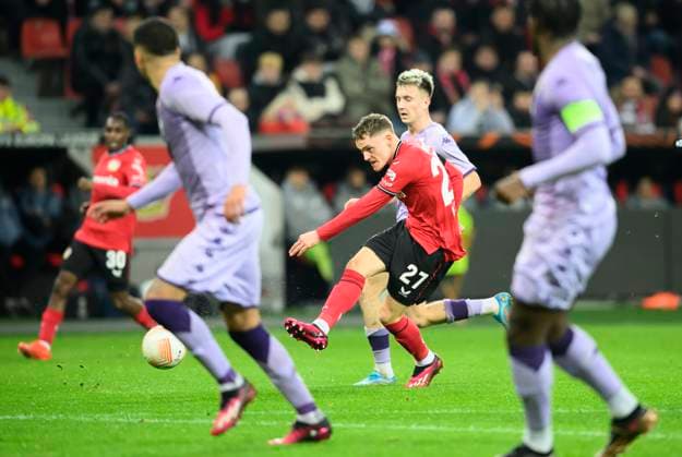 Florian WIRTZ (LEV) Aktion, Schuss, Torchance, Fussball Europa League, K.-o. Runde - Play-off Hinspiel, Bayer 04 Leverkusen (LEV) - AS Monaco, am 16.02.2023 in Leverkusen Deutschland. UEFA regulations prohibit any use of photographs as image sequences and or quasi-video Â