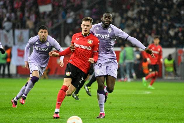 BayArena Leverkusen, 16.2.2023, Fussball: UEFA Europa League Saison 2022 23, Play-off Runde, Bayer 04 Leverkusen (B04) vs. AS Monaco (ASM) Florian Wirtz (B04), Youssouf Fofana (ASM) UEFA REGULATIONS PROHIBIT ANY USE OF PHOTOGRAPHS AS IMAGE SEQUENCES AND OR QUASI-VIDEO