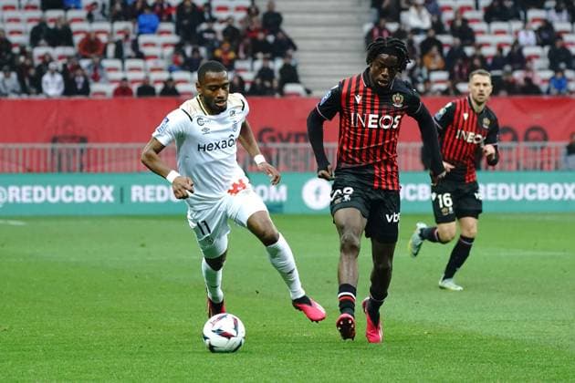 Jordan Lotomba (OGC Nice) - Myziane Maolida (Stade de Reims) FOOTBALL : OGC Nice vs Stade de Reims - Ligue 1 Ubereats - Nice - 18 02 2023 NorbertScanella Panoramic 