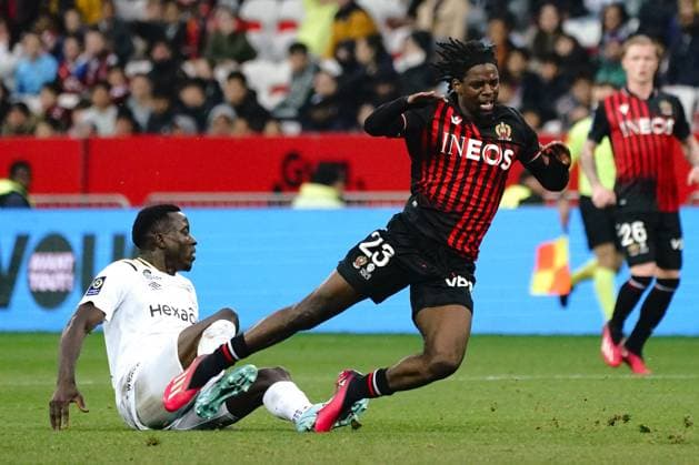 Jordan Lotomba (OGC Nice) - Dion Lopy (Stade de Reims) FOOTBALL : OGC Nice vs Stade de Reims - Ligue 1 Ubereats - Nice - 18 02 2023 NorbertScanella Panoramic 
