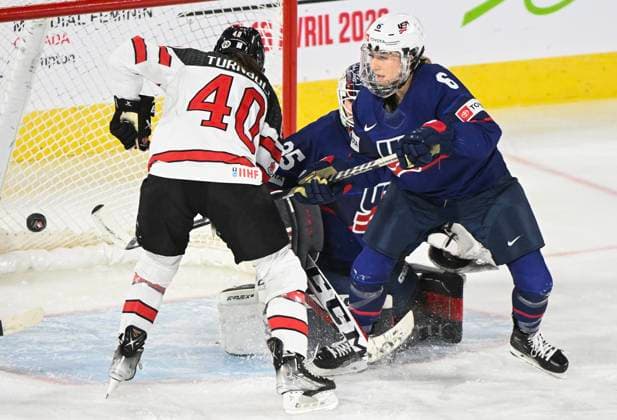 February 22, 2023, Laval, PQ, Canada: Blayre Turnbull of Canada (40) takes a shot on USA goaltender Maddie Rooney as Kali Flanagan (6) defends during third period Rivalry Series hockey action in Laval, Que., Wednesday, February 22, 2023. Blayre Turnbull, Maddie Rooney, Kali Flanagan, - ZUMAc35_ 20230222_zaf_c35_209 Copyright: xGrahamxHughesx