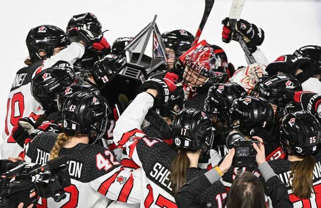 February 22, 2023, Laval, PQ, Canada: Players from Canada celebrate with the trophy after defeating the USA in Rivalry Series hockey in Laval, Que., Wednesday, February 22, 2023. Rivalry Series Hockey,  - ZUMAc35_ 20230222_zaf_c35_211 Copyright: xGrahamxHughesx