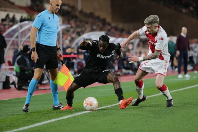 AS Monaco v Bayer 04 Leverkusen: Knockout Round Play-Off Leg Two - UEFA Europa League Jeremie Frimpong of Bayer 04 Leverkusen and Caio Henrique of As Monaco during the Uefa Europa League, football match between As Monaco and Bayer 04 Leverkusen,on 23 February 2023 at State Luis II in Monaco, Monaco Monaco  Copyright: xNderimxKacelix originalFilename:livemedia-asmonaco230223_npiti.jpg