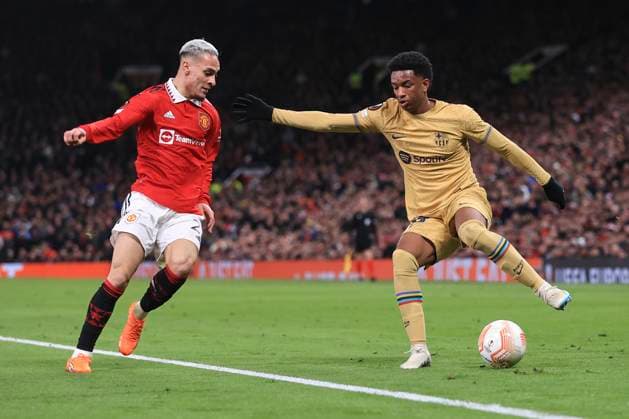 Football - UEFA Europa League - Round of 32 (2nd Leg) - Manchester United, ManU v FC Barcelona, Barca 23rd February 2023 - UEFA Europa League - Round of 32 (2nd Leg) - Manchester United v FC Barcelona - Alejandro Balde of Barcelona and Antony of Manchester United - Photo: Simon Stacpoole Offside. Manchester UK Copyright: xSimonxStacpoolexOffside