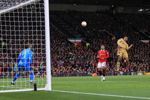Football - UEFA Europa League - Round of 32 (2nd Leg) - Manchester United, ManU v FC Barcelona, Barca 23rd February 2023 - UEFA Europa League - Round of 32 (2nd Leg) - Manchester United v FC Barcelona - Manchester United goalkeeper David de Gea saves a header from Jules Kounde of Barcelona - Photo: Simon Stacpoole Offside. Manchester UK Copyright: xSimonxStacpoolexOffside