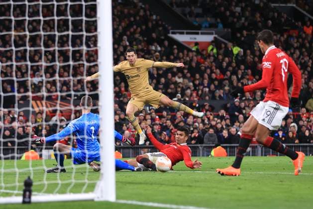 Football - UEFA Europa League - Round of 32 (2nd Leg) - Manchester United, ManU v FC Barcelona, Barca 23rd February 2023 - UEFA Europa League - Round of 32 (2nd Leg) - Manchester United v FC Barcelona - Raphael Varane of Manchester United clears a shot from Robert Lewandowski of Barcelona off the line - Photo: Simon Stacpoole Offside. Manchester UK Copyright: xSimonxStacpoolexOffside