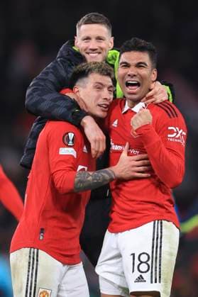 Football - UEFA Europa League - Round of 32 (2nd Leg) - Manchester United, ManU v FC Barcelona, Barca 23rd February 2023 - UEFA Europa League - Round of 32 (2nd Leg) - Manchester United v FC Barcelona - Lisandro Martinez of Manchester United, Wout Weghorst of Manchester United and Casemiro of Manchester United celebrate victory after the match - Photo: Simon Stacpoole Offside. Manchester UK Copyright: xSimonxStacpoolexOffside