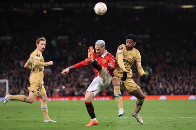 Football - UEFA Europa League - Round of 32 (2nd Leg) - Manchester United, ManU v FC Barcelona, Barca 23rd February 2023 - UEFA Europa League - Round of 32 (2nd Leg) - Manchester United v FC Barcelona - Antony of Manchester United and Jules Kounde of Barcelona - Photo: Simon Stacpoole Offside. Manchester UK Copyright: xSimonxStacpoolexOffside