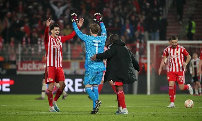 Diogo Leite, Torwart Frederik Rönnow, Jerome Roussillon jubelnd nach Schlußpfiff Spielende Freude Emotion Jubel Fußball Fussball UEL UEFA Europa League Herren Saison 2022 2023 23.02.2023 1.FC Union Berlin FCU vs. Ajax Amsterdam DFL regulations prohibit any use of photographs as image sequences and or quasi-video.