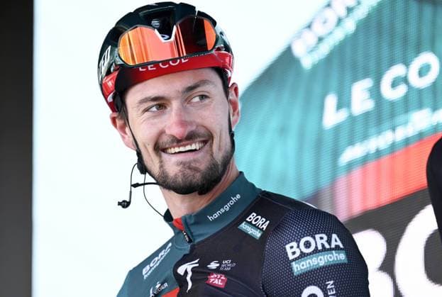 KUURNE, BELGIUM - FEBRUARY 26 : Denz Nico (GER) of BORA - Hansgrohe pictured during the UCI 1.Pro Series 75th Kuurne Brussel Kuurne cycling race with start and finish in Kuurne on February 26, 2023 in Kuurne, Belgium, 26 02 2023 ( Motordriver Kenny Verfaillie - Kuurne Brussel Kuurne 2023 Cycling Race PhotoNews Panoramic 