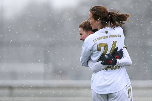 v.li.: Sarah Ernst (FCB, 13) Stefanie Reischmann (FCB, 24) mit Torjubel, Jubel, Torjubel, Torerfolg, celebrate the goal, goal, celebration, Jubel ueber das Tor zum 1:0 durch Sarah Ernst (FCB, 13), optimistisch, Action, Aktion, 26.02.2023, München (Deutschland), Fussball,2. Frauen-Bundesliga, FC Bayern München II - 1. FC Köln II, DFB DFL REGULATIONS PROHIBIT ANY USE OF PHOTOGRAPHS AS IMAGE SEQUENCES AND OR QUASI-VIDEO.