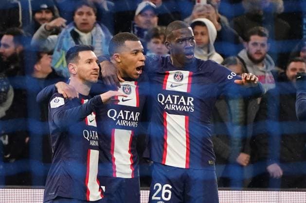 Sport Themen der Woche KW08 Sport Bilder des Tages joie - Kylian MbappÃ (PSG) - Lionel Messi (PSG) - Nordi Mukiele (PSG) - Fabian Ruiz (PSG) FOOTBALL : Olympique de Marseille vs PSG - Ligue 1 Ubereats - Marseille - 26 02 2023 NorbertScanella Panoramic 