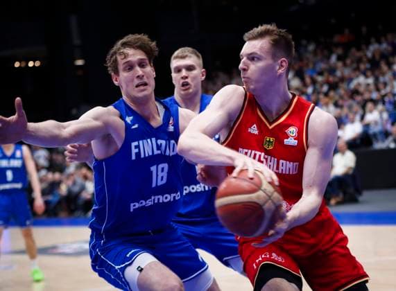 Mikael Jantunen of Finland and Justus Hollatz of Germany during the FIBA Basketball World Cup 2023 qualifying group J match between Finland and Germany at the Metro Areena on 27. February 2023 in Espoo, Finland. (Kalle Parkkinen Newspix24)  Copyright: xKallexParkkinenx np24271824913