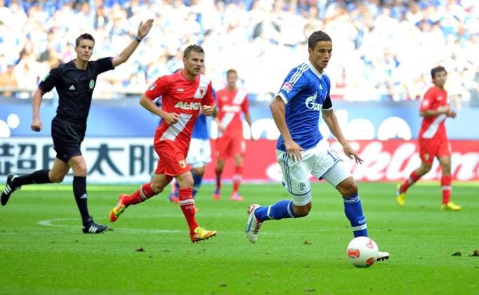 FC Schalke 04 - FC Augsburg *** NUR FÜR REDAKTIONELLE ZWECKE *** EDITORIAL USE ONLY ***<p>1. Fußball Bundesliga FC Schalke 04 - FC Augsburg 3:1 (1:0) am SAmstag, dem 01.09.2012, in der Veltins Arena Gelsenkirchen In der 83. Spielminute wurde Schalkes Leihgabe aus Barcelona, Ibrahim Afellay (re.), eingewechselt. Deutschland NRW Gelsenkirchen Copyright: MartinxMöller *** FC Schalke 04 FC Augsburg *** only for editorial Purposes *** Editorial Use only *** P 1 Football Bundesliga FC Schalke 04 FC Augsburg 3 1 1 0 at Saturday, the 01 09 2012, in the Veltins Arena Gelsenkirchen in the 83 Minute was Schalkes Loan out Barcelona, Ibrahim Afellay right , eingewechselt Germany NRW Gelsenkirchen Copyright MartinxMöller Copyright: MartinxMöller docnrwhugopicture50351780 ,EDITORIAL USE ONLY