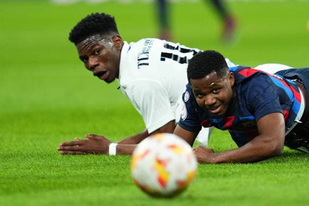 Sport Bilder des Tages ESP: Real Madrid - FC Barcelona, Barca Copa del Rey, Semifinals Aurelien Tchouameni of Real Madrid and Ansu Fati of FC Barcelona during the Copa del Rey match between Real Madrid and FC Barcelona played at Santiago Bernabeu Stadium on March 2, 2023 in Madrid, Spain. kpng Copyright: xBaguxBlancox xPRESSINx PS_230202_055