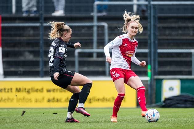 FLYERALARM. Frauen Fussball Bundesliga, 1. FC Koeln - Bayer 04 Leverkusen; 05.03.2023 Jill Baijings (Bayer 04 Leverkusen, 18), Sarah Puntigam (1. FC Koeln, 17) FLYERALARM Frauen Fussball Bundesliga, 1. FC Koeln - Bayer 04 Leverkusen, Koeln, Geissbockheim DFB REGULATIONS PROHIBIT ANY USE OF PHOTOGRAPHS AS IMAGE SEQUENCES AND OR QUASI-VIDEO. Copyright: xBEAUTIFULxSPORTS Wunderlx