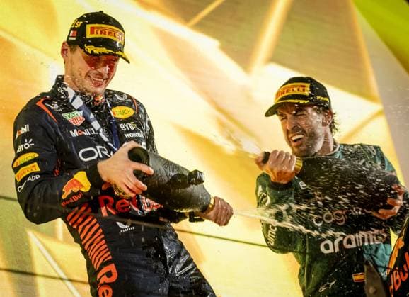 BAHRAIN - Max Verstappen (Red Bull Racing) and Fernando Alonso (Aston Martin) on the podium after the Bahrain Grand Prix. It is the first race of the 2023 Formula 1 season. ANP SEM VAN DER WAL F1 Grand Prix of Bahrain 2023 xVIxANPxSportx xxANPxIVx 464252371 originalFilename: 464252371.jpg