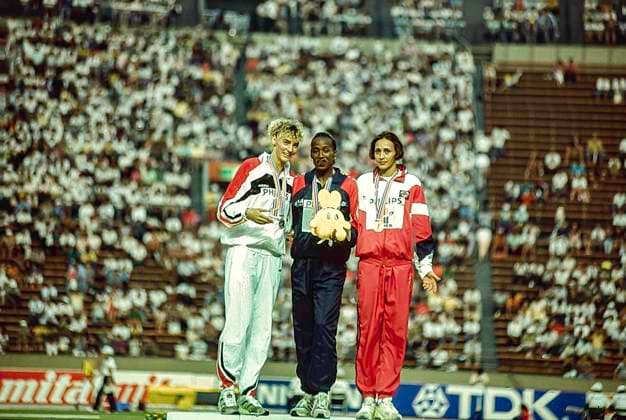 Track and Field Jackie Joyner-Kersee Jackie Joyner-Kersee (USA)-C- wins gold medal in the Women s Long Jump, Heike Drechsler (GR) -L- silver, Larysa Berezhna (URS) bronze,at the 1991 World Outdoor Track and Field Championships Tokyo Olympic Stadium Japan Copyright: xStevenxE.xSutton DUOMO PCNx TF1202 061735