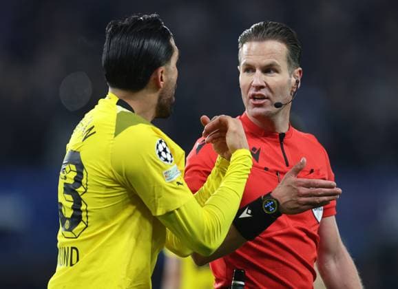 London, England, 7th March 2023. Emre Can of Borussia Dortmund complains to referee Danny Makkelie during the UEFA Champions League match at Stamford Bridge, London. Picture credit should read: David Klein Sportimage EDITORIAL USE ONLY. No use with unauthorised audio, video, data, fixture lists, club league logos or live services. Online in-match use limited to 120 images, no video emulation. No use in betting, games or single club league player publications. SPI-2283-0084