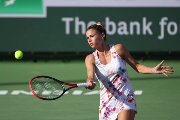 INDIAN WELLS, CA - MARCH 08: Camila Giorgi (ITA) hits a volley during the BNP Paribas Open on March 8, 2023 at the Indian Wells Tennis Garden in Indian Wells, CA. (Photo by George Walker Icon Sportswire) TENNIS: MAR 08 BNP Paribas Open Icon230308025
