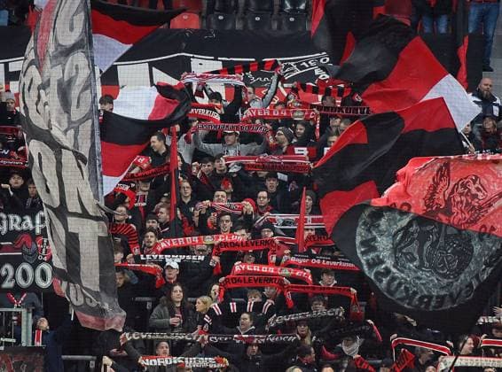 09.03.2023, xhbx, Fussball UEFA Europa League 1 8 Finale, Bayer 04 Leverkusen - Ferencvaros Budapest emspor, v.l. Fans, Schal, Banner, Fahne von Bayer Leverkusen (DFL DFB REGULATIONS PROHIBIT ANY USE OF PHOTOGRAPHS as IMAGE SEQUENCES and or QUASI-VIDEO) Leverkusen