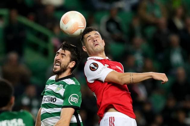 March 9, 2023, Lisbon, Portugal: Paulinho of Sporting CP (L) vies with Granit Xhaka of Arsenal FC during the UEFA Europa League round of 16 leg one football match between Sporting CP and Arsenal FC at Alvalade stadium in Lisbon, Portugal, on March 9, 2023. Lisbon Portugal - ZUMAf123 20230309_zap_f123_016 Copyright: xPedroxFiuzax