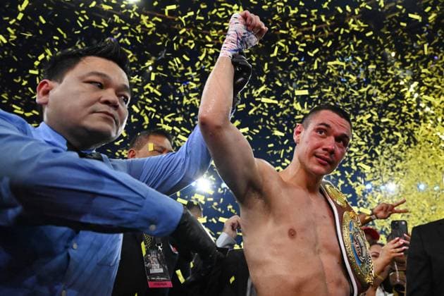 Sport Themen der Woche KW10 Sport Bilder des Tages BOXING TSZYU HARRISON, Australian boxer Tim Tszyu celebfrates his win over United States boxer Tony Harrison during the interim World Boxing Organization (WBO) super-welterweight world title fight at Qudos Bank Arena in Sydney, Sunday, March 12, 2023. ( NO ARCHIVING, EDITORIAL USE ONLY, NO USE IN BOOKS WITHOUT CONSENT SYDNEY NEW SOUTH WALES AUSTRALIA  Copyright: xDEANxLEWINSx 20230312001774228228