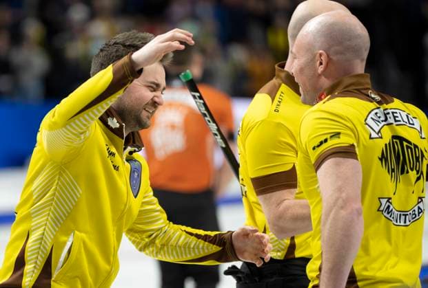 March 12, 2023, London, ON, Canada: Manitoba skip Matt Dunstone celebrates with 3rd B.J. Neufeldafter defeating Wild Card 1 s Brendan Bottcher in the semifinal game at the 2023 Tim Hortons Brier in London, Ont., Sunday, March 12, 2023. Canada News - March 12, 2023  - ZUMAc35_ 20230312_zaf_c35_012 Copyright: xFrankxGunnx