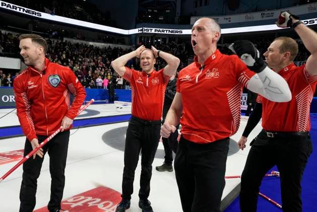 March 12, 2023, London, ON, Canada: Team Canada skip Brad Gushue, left to right, Mark Nichols, EJ Harnden and Geoff Walker celebrate defeating Team Manitoba in the finals of the 2023 Tim Hortons Brier in London, Ont., Sunday, March 12, 2023. Canada News - March 12, 2023 - ZUMAc35_ 20230312_zaf_c35_042 Copyright: xFrankxGunnx