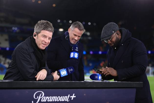 Football - UEFA Champions League - Round of 16 (2nd Leg) - Manchester City v RB Leipzig 14th March 2023 - UEFA Champions League - Round of 16 (2nd Leg) - Manchester City v RB Leipzig - Musician Noel Gallagher (L) stands alongside Jamie Carragher (C) and Micah Richards (R) as they work for CBS Sports in conjunction with Paramount+ television - Photo: Simon Stacpoole Offside. Manchester UK Copyright: xSimonxStacpoolexOffside