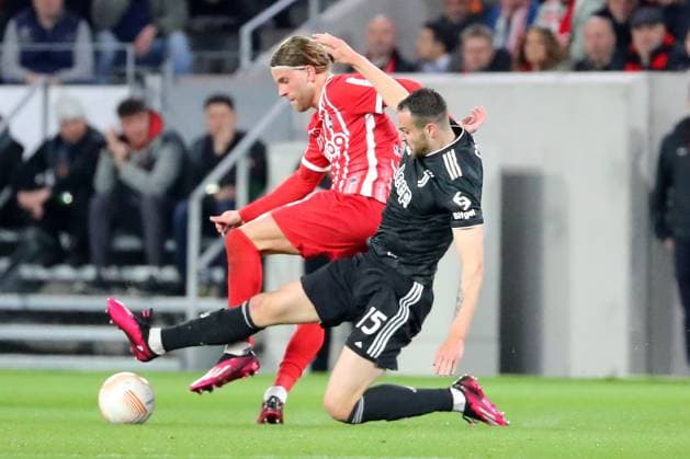 16.03.2023, xtvx, Fussball UEFA Europa League 1 8 Finale, SC Freiburg - Juventus Turin emspor, v.l. Lucas Hoeler (SC Freiburg) Federico Gatti (Juventus Turin) Zweikampf, Aktion, action, battle for the ball (DFL DFB REGULATIONS PROHIBIT ANY USE OF PHOTOGRAPHS as IMAGE SEQUENCES and or QUASI-VIDEO) Freiburg