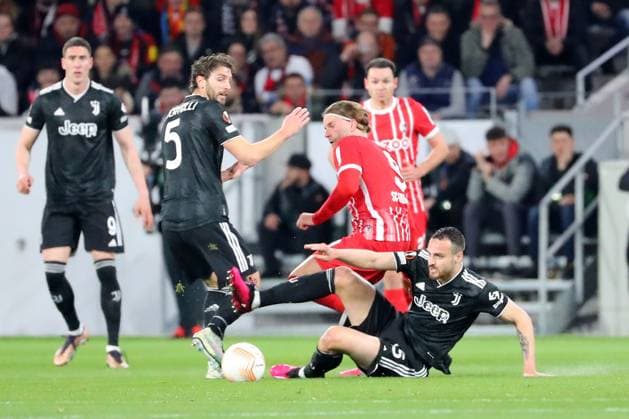 16.03.2023, xtvx, Fussball UEFA Europa League 1 8 Finale, SC Freiburg - Juventus Turin emspor, v.l. Lucas Hoeler (SC Freiburg) Federico Gatti (Juventus Turin) Zweikampf, Aktion, action, battle for the ball (DFL DFB REGULATIONS PROHIBIT ANY USE OF PHOTOGRAPHS as IMAGE SEQUENCES and or QUASI-VIDEO) Freiburg