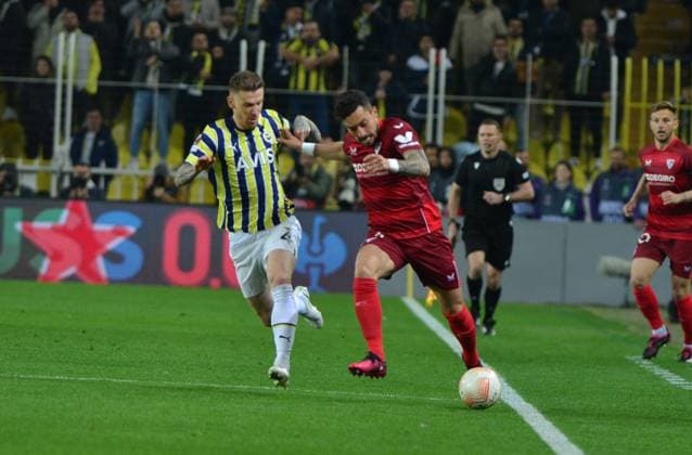 Serdar Aziz (L) of Fenerbahce and Alex Telles (R) of Sevilla during the UEFA Europa League round of 16 leg two match between Fenerbahce and Sevilla FC at Ulker Sukru Saracoglu Stadium in Istanbul, Turkey on March 16, 2023. Istanbul Turkey Copyright: xSeskimphotox Fenerbahce-Sevilla-16323 (46)