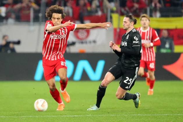 16.03.2023, xtvx, Fussball UEFA Europa League 1 8 Finale, SC Freiburg - Juventus Turin emspor, v.l. Kilian Sildillia (SC Freiburg) Adrien Rabiot (Juventus Turin) Zweikampf, Aktion, action, battle for the ball (DFL DFB REGULATIONS PROHIBIT ANY USE OF PHOTOGRAPHS as IMAGE SEQUENCES and or QUASI-VIDEO) Freiburg