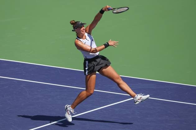 INDIAN WELLS, CA - MARCH 17: Beatriz Haddad Maia (BRA) hits an overhead during the BNP Paribas Open on March 17, 2023 at the Indian Wells Tennis Garden in Indian Wells, CA. (Photo by George Walker Icon Sportswire) TENNIS: MAR 17 BNP Paribas Open Icon230317066