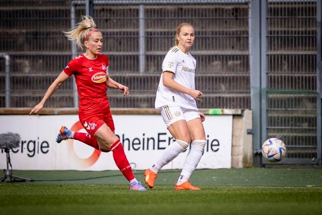 1. Frauen-Bundesliga; 1. FC Koeln vs. FC Bayern Muenchen, 18.03.2023 Maximiliane Rall (FC Bayern Muenchen, 8), Mandy Islacker (8, 1. FC Koeln)waehrend der Begegnung 1. FC Koeln vs. FC Bayern Muenchen an Spieltag 15 der Frauen-Fussball-Bundesliga am 18.03.2023 im Franz-Kremer-Stadion in Koeln (Nordrhein-Westfalen). DFL REGULATIONS PROHIBIT ANY USE OF PHOTOGRAPHS AS IMAGE SEQUENCES AND OR QUASI-VIDEO. Copyright: xBEAUTIFULxSPORTS AxelxKohringx