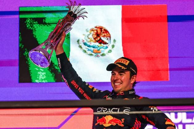 (230320) -- JEDDAH, March 20, 2023 -- Red Bull Racing s Mexican driver Sergio Perez celebrates with trophy during the 2023 Formula 1 Saudi Arabian Grand Prix at Jeddah Corniche Circuit in Jeddah, Saudi Arabia on March 19, 2023. (Photo by Xinhua) (SP)SAUDI ARABIA-JEDDAH-F1-SAUDI ARABIAN GRAND PRIX QianxJun 