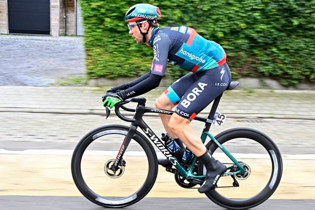 DE PANNE, BELGIUM - MARCH 22 : Schachmann Maximilian (GER) of BORA - hansgrohe during the 1.UWT - UCI WorldTour 2023 Brugge De Panne Classic, a race of 211 kms with start in Brugge and finish in De Panne on March 22, 2023 in De Panne, Belgium, 22 03 2023 ( Motordriver Kenny Verfaillie - Brugge De Panne Classic 2023 Cycling Race PhotoNews Panoramic 