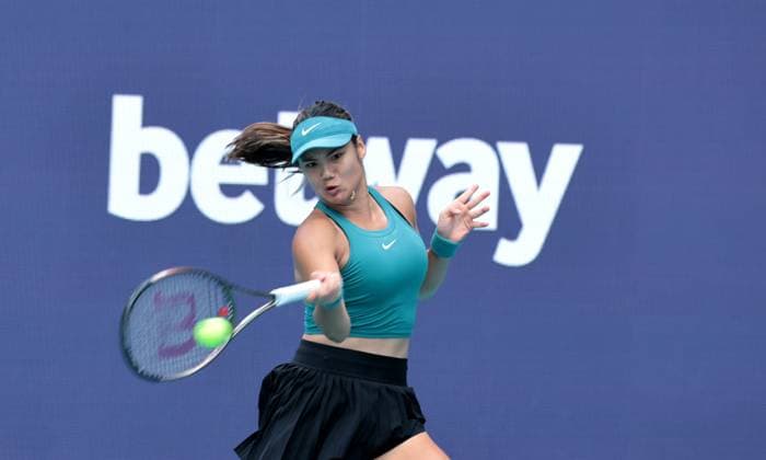 Emma Raducanu from Great Britain returns the ball to Bianca Andreescu from Canada in the third set on opening day of the Miami Open in the Hard Rock Stadium in Miami Gardens, Florida, on Wednesday, March 22, 2023. Andreescu defeated Raducanu 6-3, 3-6, 6-2.  MIA20230322119 GARYxIxROTHSTEIN
