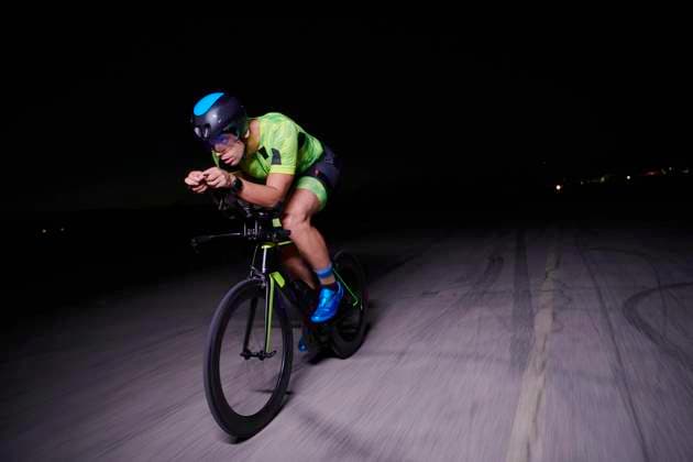 triathlon athlete riding bike fast at night triathlon athlete cycling fast riding professional racing bike at night (License=RF) 16247946 ,model released, Symbolfoto Copyright: xZoonar.com benisxarapovicx 16247946 ,model released, Symbolfoto ,property released