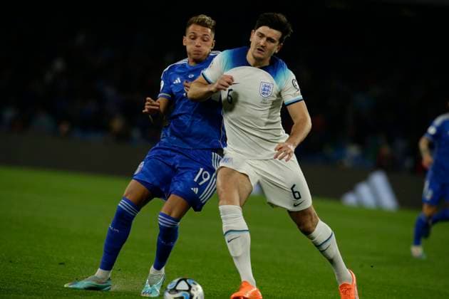 Italy: Italian s forward Mateo Retegui (Tigre) challenges for the ball with England s defender Harry Maguire (Manchester Utd) during European Qualifiers match Italy vs England at the Diego Armando Maradona Stadium in Naples, southern Italy, on March 23, 2023. Italy_England_2890 Copyright: xAntonioxBalascox