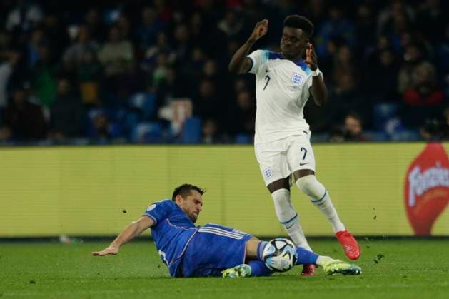 Italy: Italian s defender Rafael Toloi (Atalanta) challenges for the ball with England s forward Bukayo Saka (Arsenal) during European Qualifiers match Italy vs England at the Diego Armando Maradona Stadium in Naples, southern Italy, on March 23, 2023. Italy_England_2967 Copyright: xAntonioxBalascox