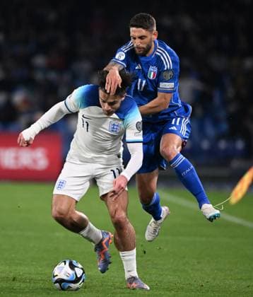 (230324) -- NAPLES, March 24, 2023 -- England s Jack Grealish (L) vies with Italy s Domenico Berardi during a UEFA EURO, EM, Europameisterschaft,Fussball 2024 Group C qualification match between Italy and England in Naples, Italy, March 23, 2023. (Photo by Xinhua) (SP)ITALY-NAPLES-FOOTBALL-UEFA EURO QUALIFIERS-ITALY VS ENGLAND AlbertoxLingria 