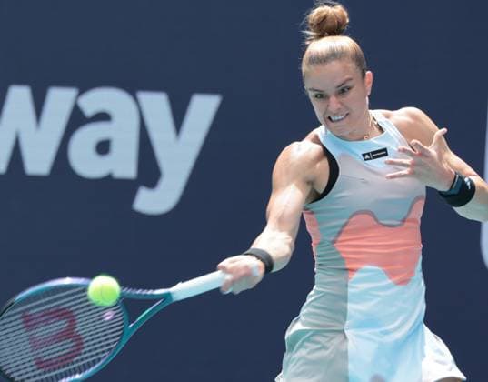 Maria Sakkara from Greece hits a forehand shot to Bianca Andreescu from Canada during day three at the Miami Open in the Hard Rock Stadium in Miami Gardens, Florida, on Friday, March 24, 2023. Andreescu defeated Sakkara 7-7,6-3,6-4.  MIA20230324109 GARYxIxROTHSTEIN
