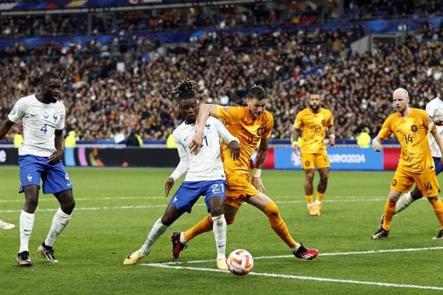 SAINT-DENIS - (lr) Eduardo Camavinga of France, Wout Weghorst of Holland during the UEFA EURO, EM, Europameisterschaft,Fussball 2024 qualifying match between France and Netherlands at Stade de France on March 24, 2023 in Saint-Denis, France. ANP MAURICE VAN STONE UEFA EURO 2024 Qualifying Round 2022 2023 xVIxANPxSportx xxANPxIVx 465706768 originalFilename: 465706768.jpg