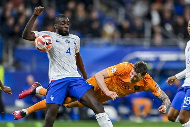 PARIS, 24-03-2023, Stade de France, UEFA Qualification EURO 2024 Football, season 2022 2023, France - Netherlands, final result 4-0, France player Dayot Upamecano, Netherlands player Wout Weghorst France - Netherlands  x20317936x Copyright: