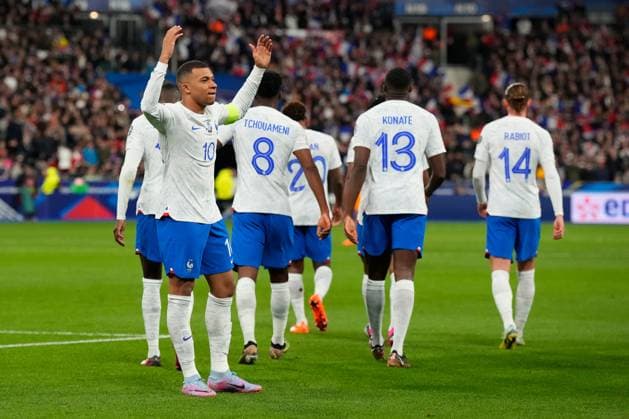 (230325) -- PARIS, March 25, 2023 -- France s Kylian Mbappe (front) celebrates his goal during the UEFA EURO, EM, Europameisterschaft,Fussball 2024 qualification match between France and the Netherlands in Paris, France, March 24, 2023. (Photo by Glenn Gervot Xinhua) (SP)FRANCE-PARIS-FOOTBALL-UEFA EURO 2024 QUALIFIERS-FRANCE VS NETHERLANDS GxLennGervotgaojing 