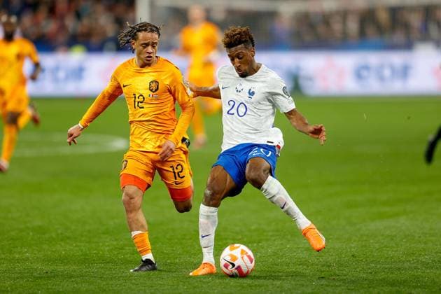 PARIS 24.03.2023, xabx EURO 2024 Qualifiers Group B France - Netherlands v.l., Xavi Simons Randal (Netherlands), Kolo Muani (FFF Frankreich), Zweikampf, Action, Aktion, Battles for the Ball Copyright: AntonioxBorga