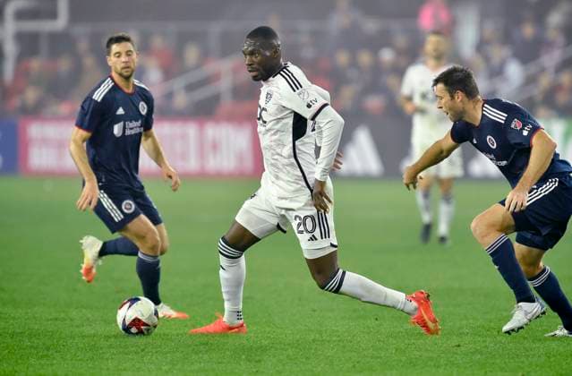 WASHINGTON, DC - MARCH 25: DC United forward Christian Benteke (20) dribbles during the New England Revolution versus D.C. United Major League Soccer MLS, Fussball Herren, USA game on March 25, 2023 at Audi Field in Washington, D.C.. (Photo by Randy Litzinger Icon Sportswire) SOCCER: MAR 25 MLS - D.C. United vs New England Revolution Icon9662303250516